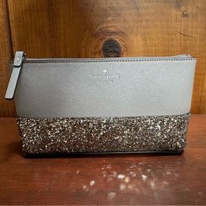 Gray Kate Spade mini bag.